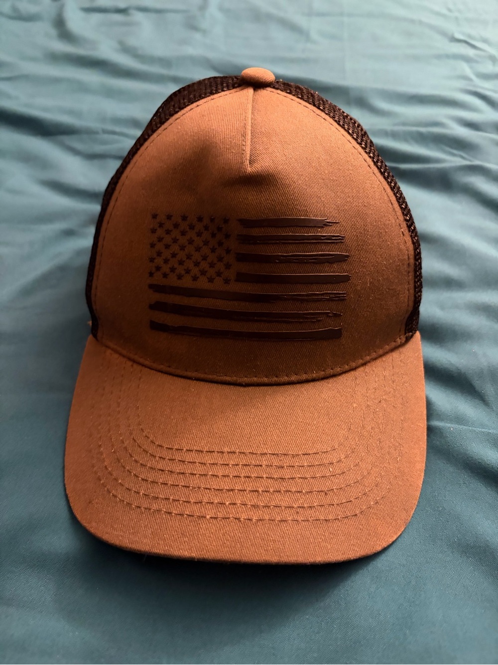 Olive green and black Mesh-Back Trucker Cap with Subtle American Flag